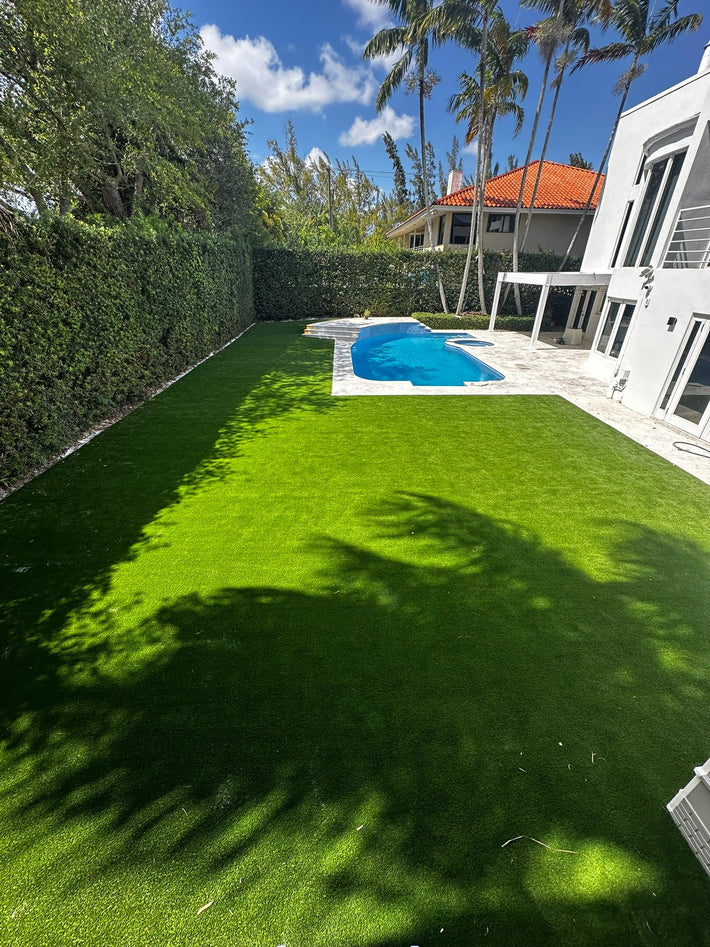 Artificial turf patio installed to create a soft, low-maintenance outdoor space in Miami