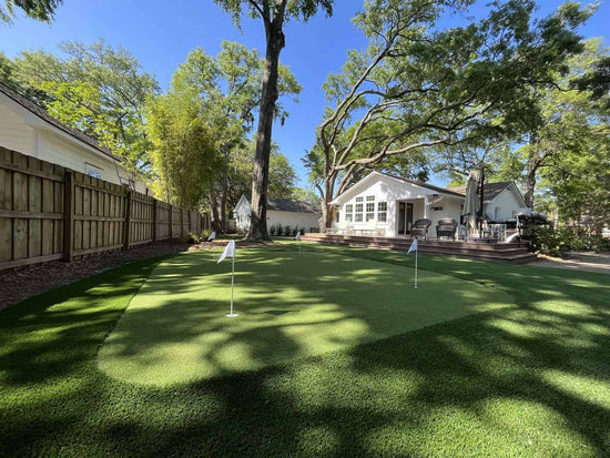 Artificial turf putting green added to residential backyard in Miami, Florida