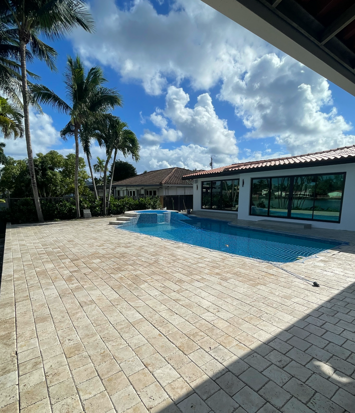 Brick paver deck transforming a backyard into an elegant Miami outdoor space