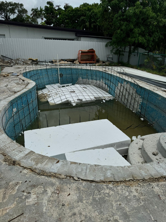 Backyard pool construction project designed and built from the ground up in Miami