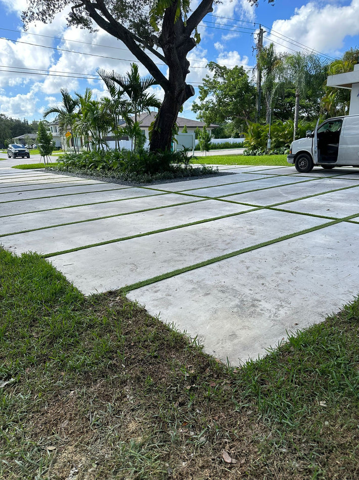 Custom decorative driveway enhancing the exterior design of a Florida home