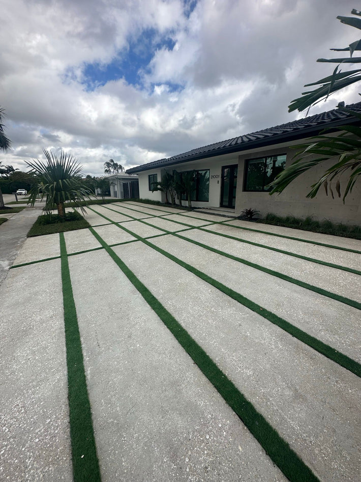 Custom-designed exposed aggregate driveway blending style and strength in Miami