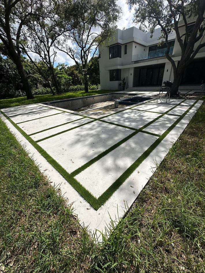 Custom stamped concrete patio deck installed for unique outdoor style in Miami