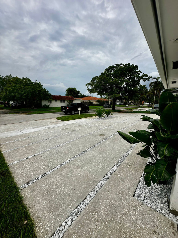 Exposed aggregate driveway installed for a durable and decorative entrance in Miami