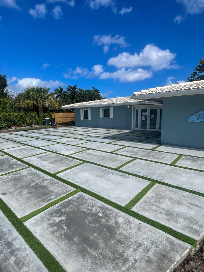 Luxury concrete driveway with decorative elements designed for upscale homes
