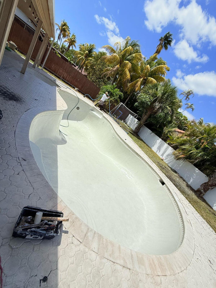 Modern pool resurfaced with Diamond Brite for a sleek and elegant appearance