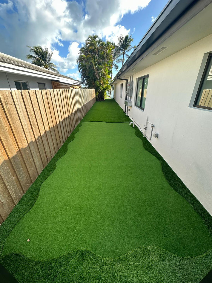 Backyard putting green professionally installed for private golf practice in Miami