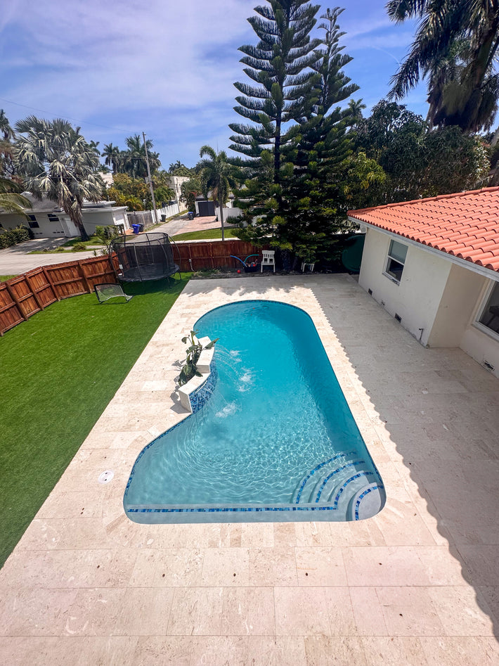 Natural stone decking installation service in South Florida for residential properties